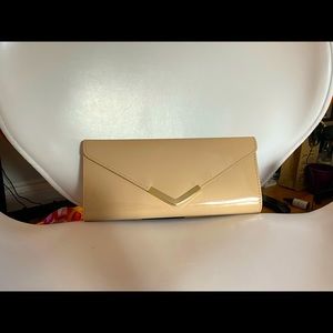 Beige Aldo clutch. With gold chain. Used once.